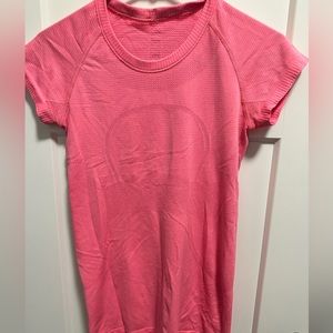 Lululemon size 6 swiftly tech shirt.  Pink